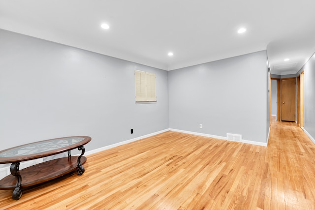 24719 Audrey Ave, Warren, MI 48091 - below grade area featuring light wood-type flooring, baseboards, and recessed lighting