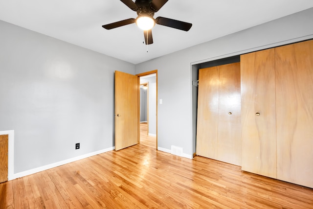 24719 Audrey Ave, Warren, MI 48091 - unfurnished bedroom with a closet, baseboards, light wood-style floors, and ceiling fan