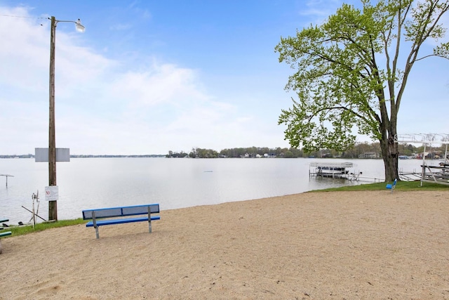 water view featuring a dock