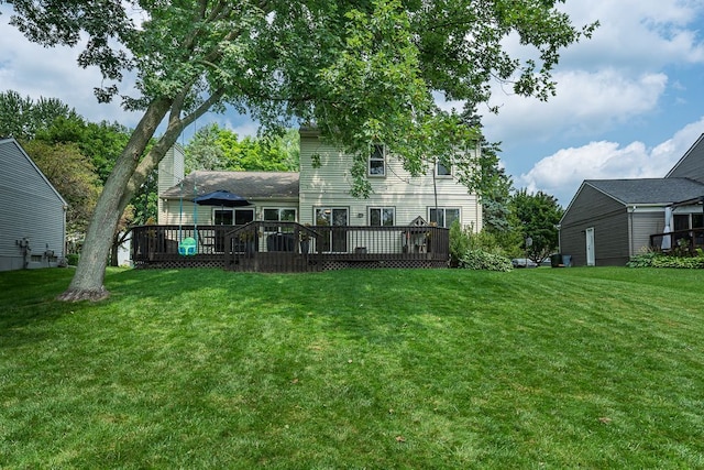 318 Arlington Dr, Rochester Hills, MI 48307 - back of house with a wooden deck and a lawn