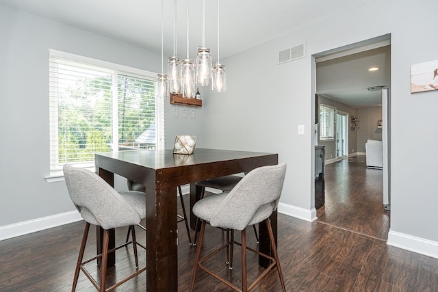 318 Arlington Dr, Rochester Hills, MI 48307 - dining area with dark wood finished floors and baseboards