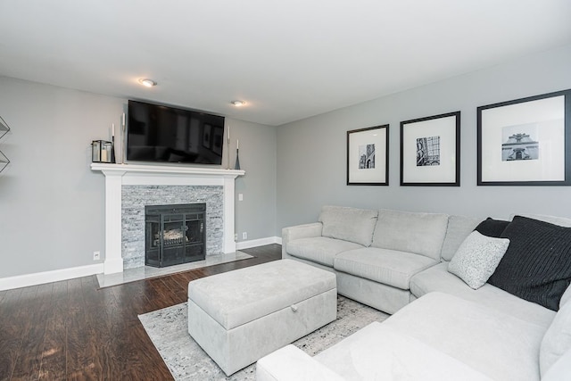 318 Arlington Dr, Rochester Hills, MI 48307 - living area with baseboards, wood finished floors, and a stone fireplace