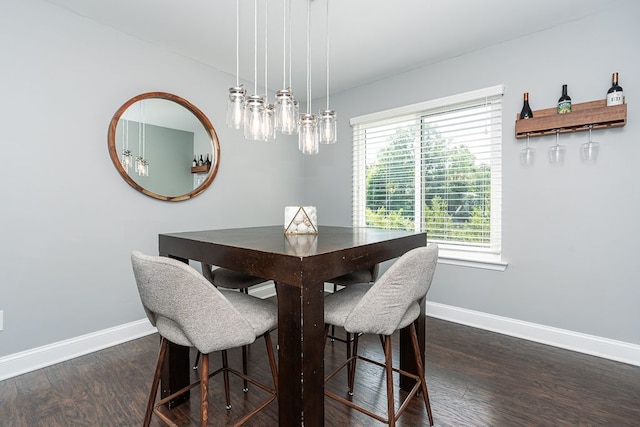 318 Arlington Dr, Rochester Hills, MI 48307 - dining space featuring a chandelier, baseboards, and dark wood-style floors