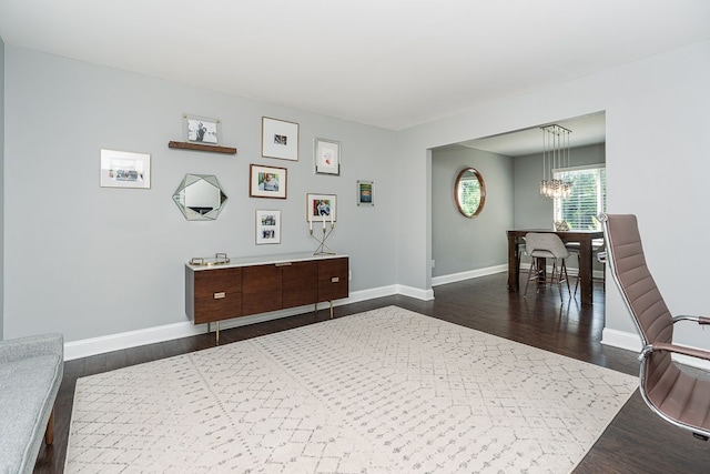 318 Arlington Dr, Rochester Hills, MI 48307 - interior space featuring dark wood finished floors, baseboards, and a chandelier