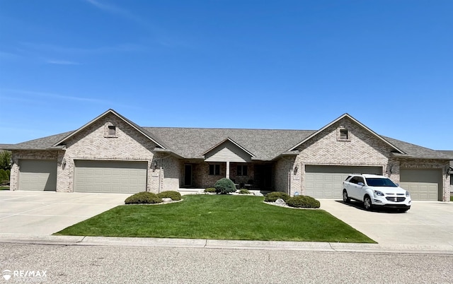 ranch-style home with driveway, a garage, and brick siding