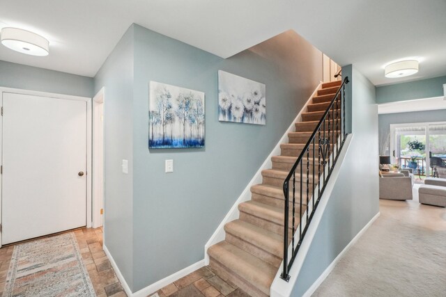 4630 Pasture Ln, White Lake, MI 48383 - stairway with stone tile floors and baseboards