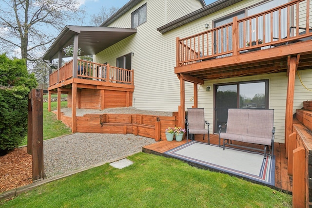4630 Pasture Ln, White Lake, MI 48383 - rear view of house featuring a wooden deck, a lawn, and a patio area