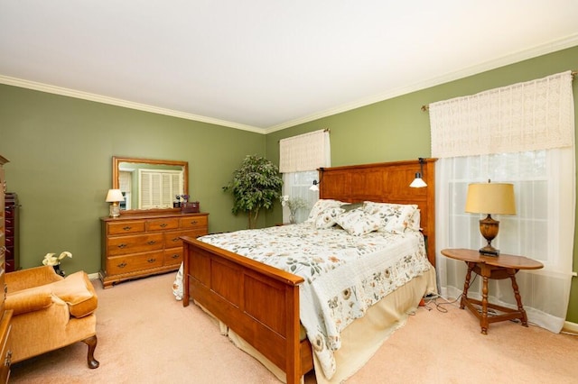 bedroom with light carpet, crown molding, and baseboards