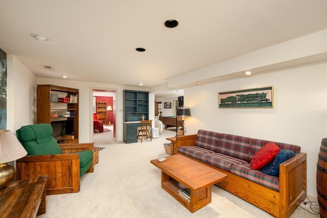 living room with carpet flooring and recessed lighting