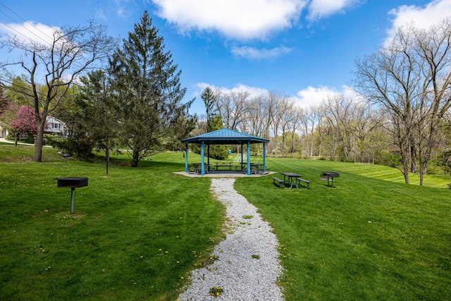 surrounding community featuring a gazebo and a yard