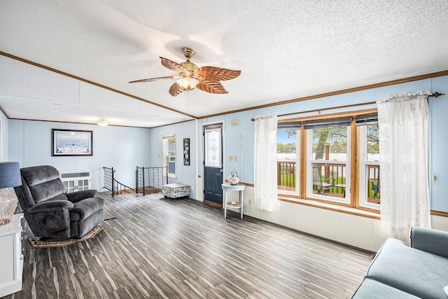 347 Lou Alice Dr, Columbiaville, MI 48421 - living area with crown molding, wood finished floors, a textured ceiling, healthy amount of natural light, and a ceiling fan