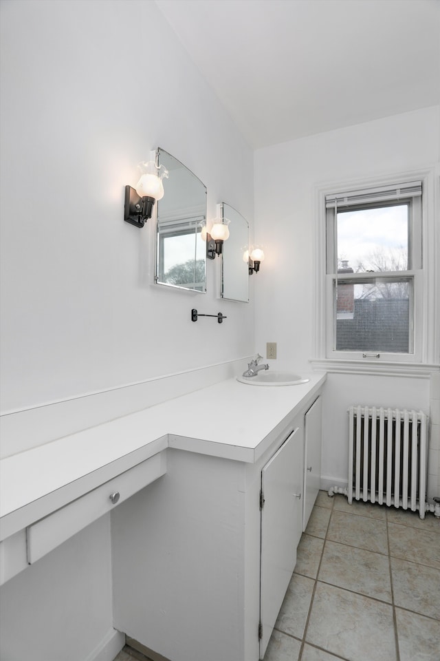 475 Saint Clair St, Grosse Pointe, MI 48230 - bathroom with radiator, tile patterned flooring, vanity, and baseboards