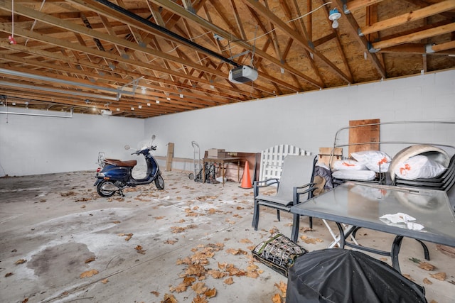 475 Saint Clair St, Grosse Pointe, MI 48230 - garage with a garage door opener and concrete block wall