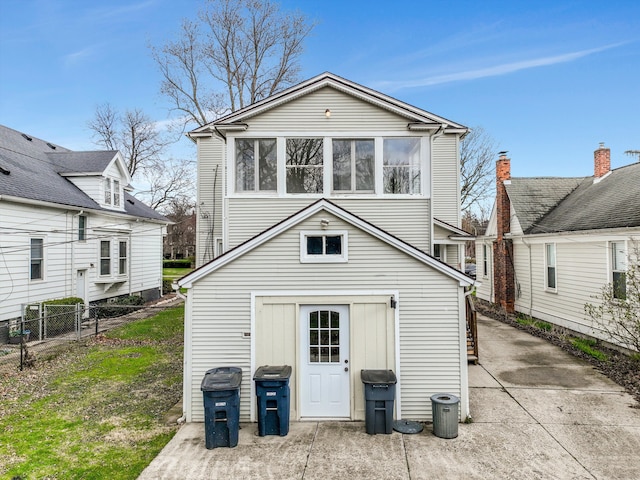 475 Saint Clair St, Grosse Pointe, MI 48230 - rear view of house featuring fence