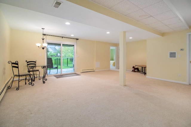 unfurnished room with carpet flooring, baseboard heating, recessed lighting, and baseboards