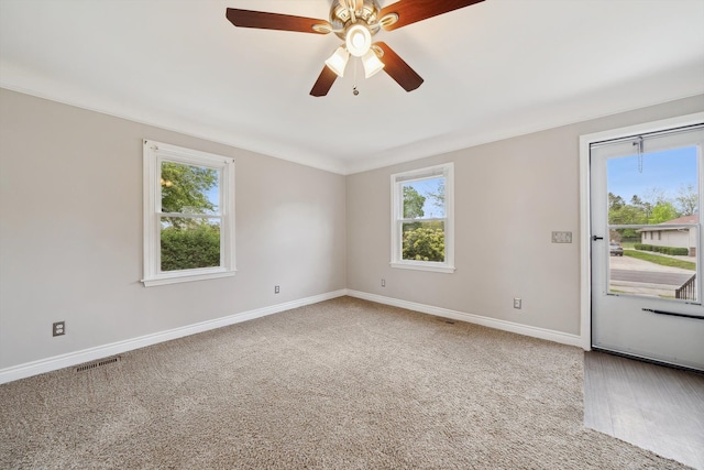 3040 Waukegan St, Auburn Hills, MI 48326 - spare room featuring baseboards, carpet, and ceiling fan