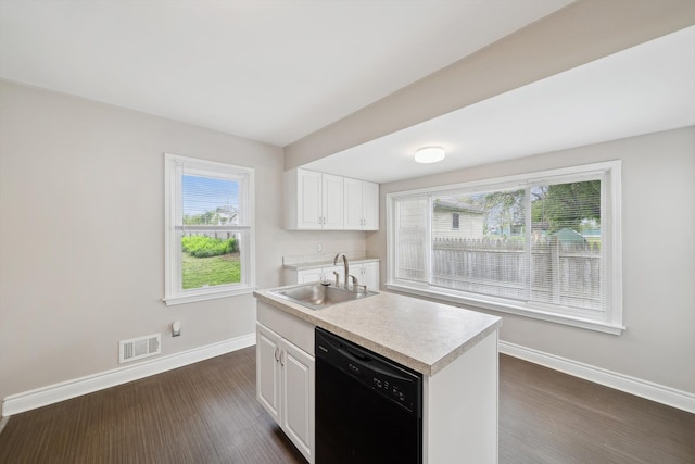 3040 Waukegan St, Auburn Hills, MI 48326 - kitchen with a sink, black dishwasher, baseboards, light countertops, and dark wood-style floors