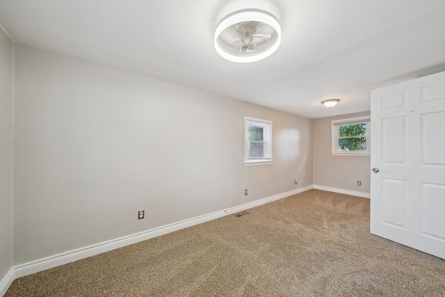 3040 Waukegan St, Auburn Hills, MI 48326 - unfurnished bedroom featuring baseboards and carpet flooring