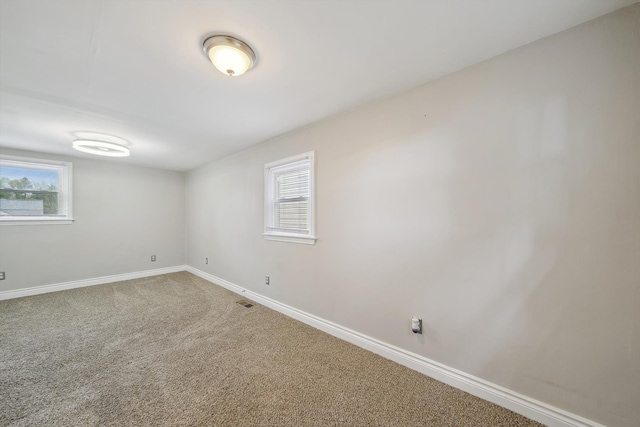 3040 Waukegan St, Auburn Hills, MI 48326 - carpeted empty room featuring baseboards