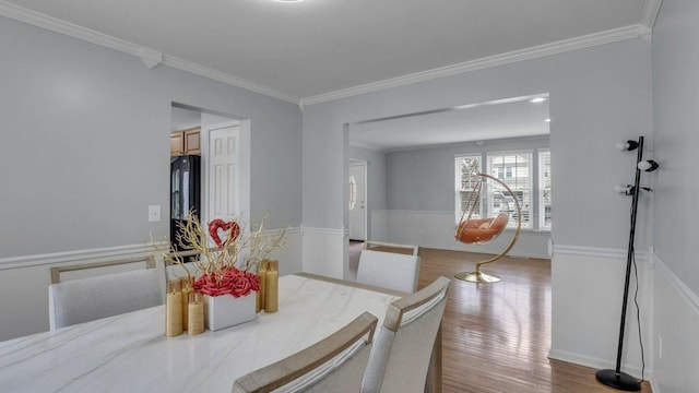 56501 Winding Creek Dr, Macomb, MI 48042 - dining area featuring wood finished floors and crown molding