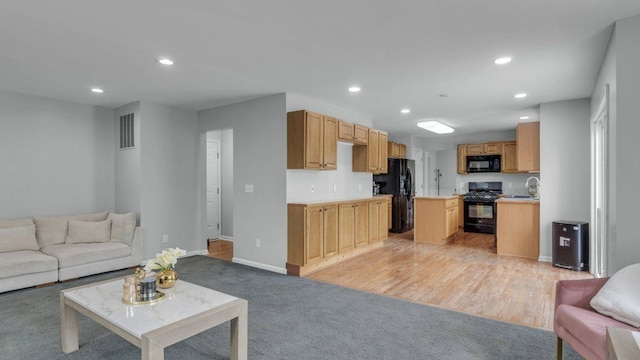 56501 Winding Creek Dr, Macomb, MI 48042 - living room featuring recessed lighting and baseboards