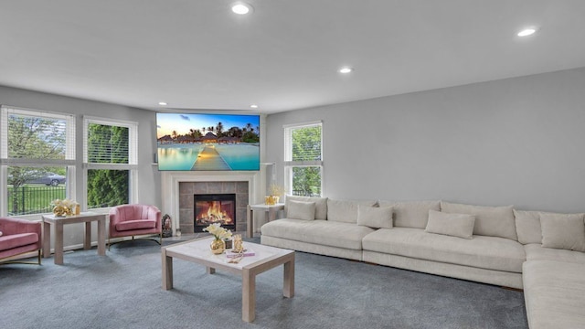 56501 Winding Creek Dr, Macomb, MI 48042 - living room featuring recessed lighting, a fireplace, and carpet