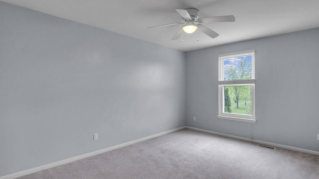 56501 Winding Creek Dr, Macomb, MI 48042 - carpeted empty room with baseboards and a ceiling fan