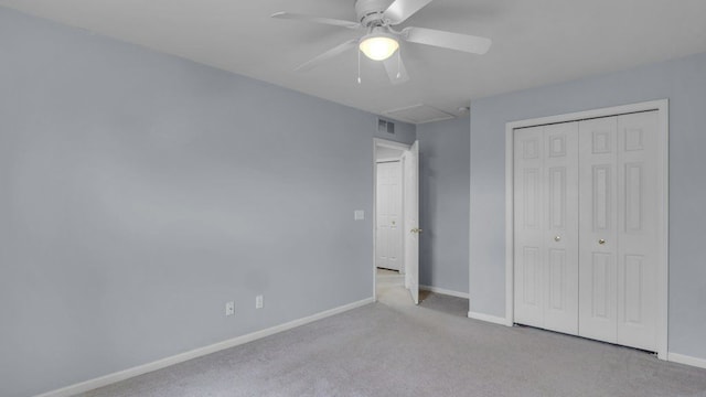 56501 Winding Creek Dr, Macomb, MI 48042 - unfurnished bedroom featuring carpet floors, baseboards, a closet, and attic access