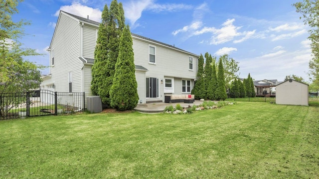 56501 Winding Creek Dr, Macomb, MI 48042 - rear view of property with a garage, a patio, central AC, and an outdoor structure