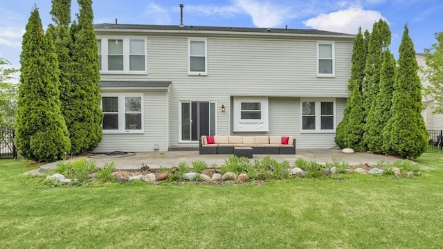 56501 Winding Creek Dr, Macomb, MI 48042 - rear view of house with an outdoor hangout area, a patio, and a lawn