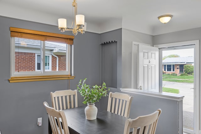 dining area with a chandelier