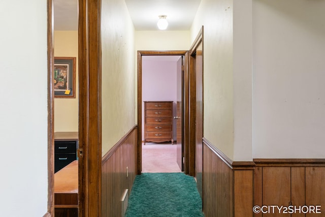 4618 New Holland St, Hudsonville, MI 49426 - hallway featuring a wainscoted wall and dark colored carpet