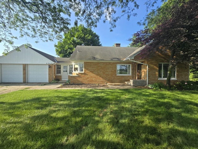 4618 New Holland St, Hudsonville, MI 49426 - ranch-style home featuring brick siding, a front lawn, driveway, and an attached garage