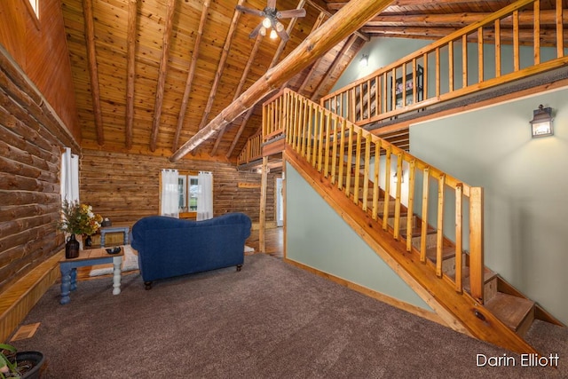 5359 Huck Dr, Sheridan, MI 48884 - unfurnished living room with wooden ceiling, log walls, high vaulted ceiling, carpet, and beamed ceiling