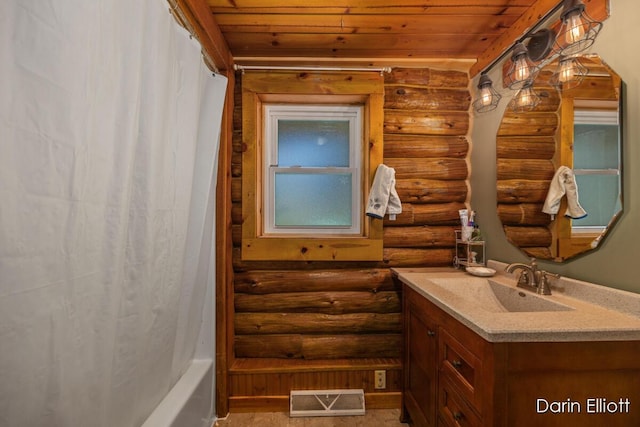 5359 Huck Dr, Sheridan, MI 48884 - full bath with log walls, wood ceiling, and vanity
