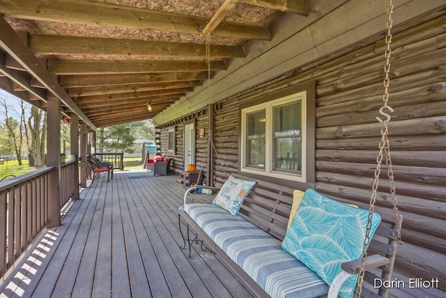 5359 Huck Dr, Sheridan, MI 48884 - wooden terrace featuring covered porch