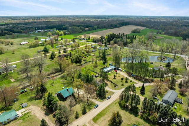 5359 Huck Dr, Sheridan, MI 48884 - aerial overview of property's location featuring a nearby body of water and rural landscape