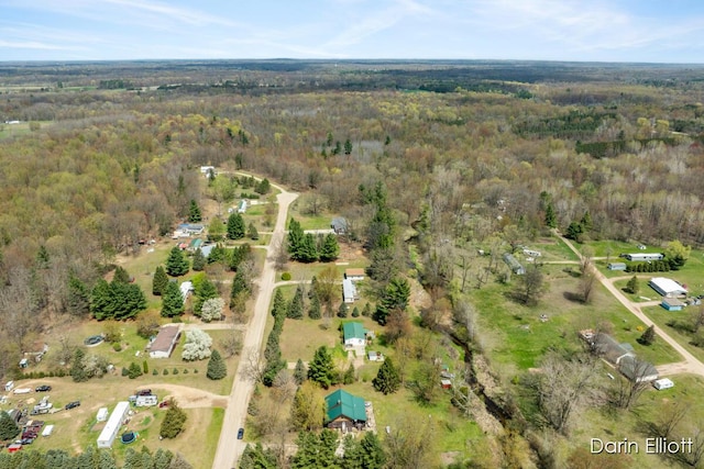 5359 Huck Dr, Sheridan, MI 48884 - view of property location with a heavily wooded area