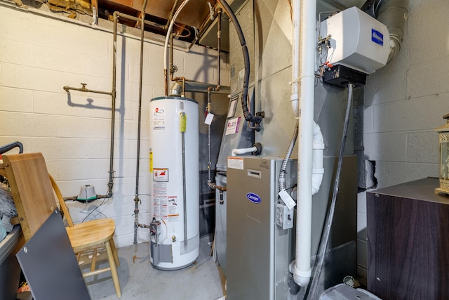 utility room featuring gas water heater and heating unit