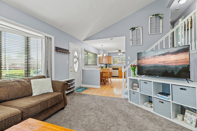 living room with vaulted ceiling, a chandelier, baseboards, carpet flooring, and wood finished floors