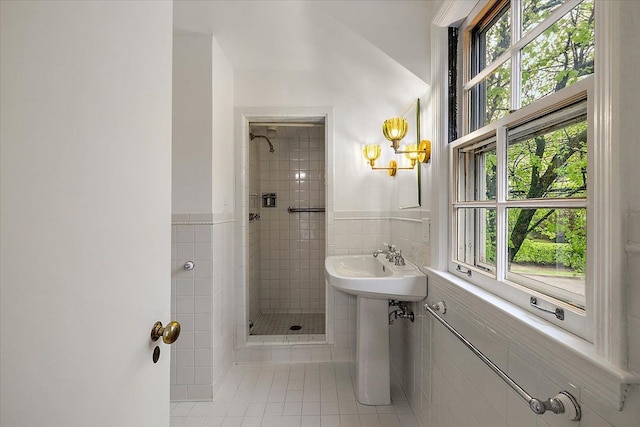 75 Grosse Pointe Blvd, Grosse Pointe Farms, MI 48236 - full bath with tile walls, a stall shower, healthy amount of natural light, tile patterned flooring, and a sink