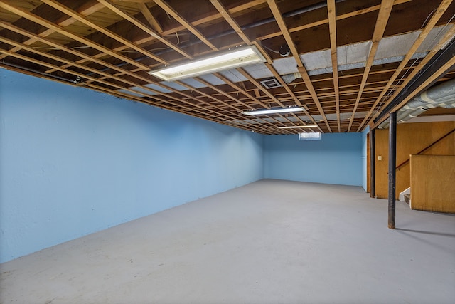 basement featuring stairway