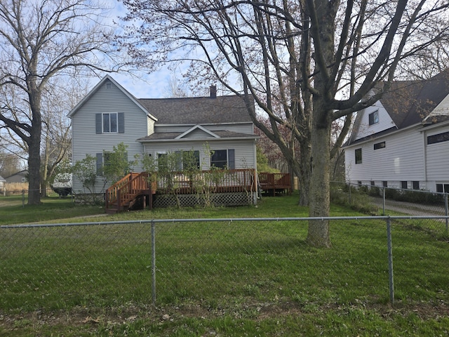 view of front of property with a deck, roof with shingles, and a chimney