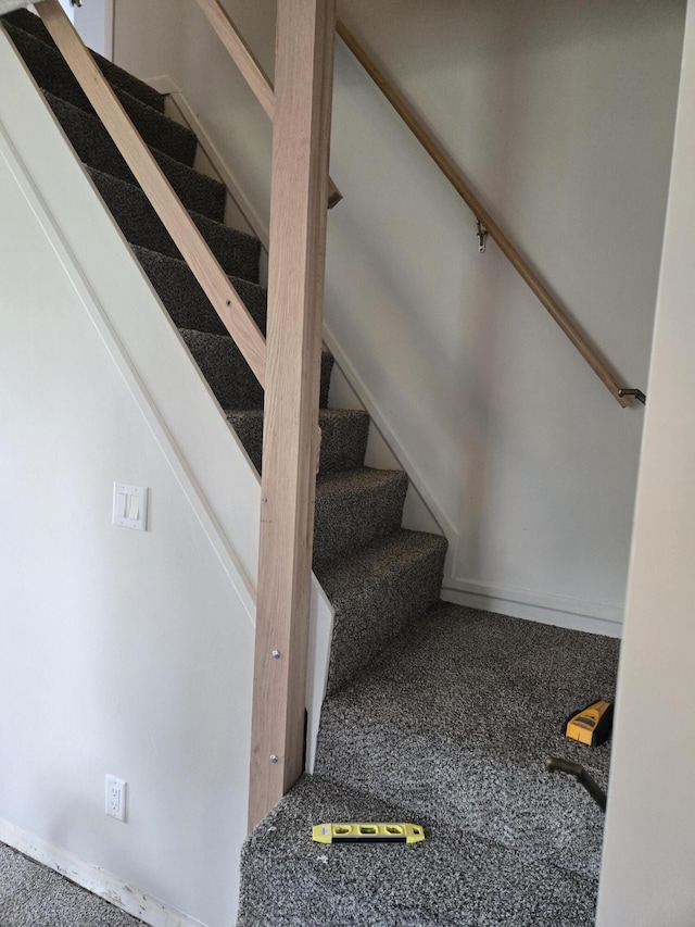 staircase with carpet