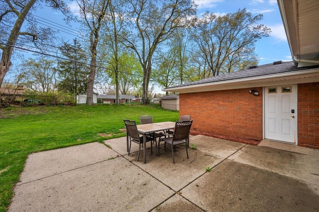 view of patio featuring outdoor dining area