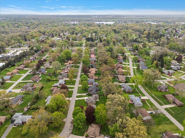 aerial view of property's location with nearby suburban area