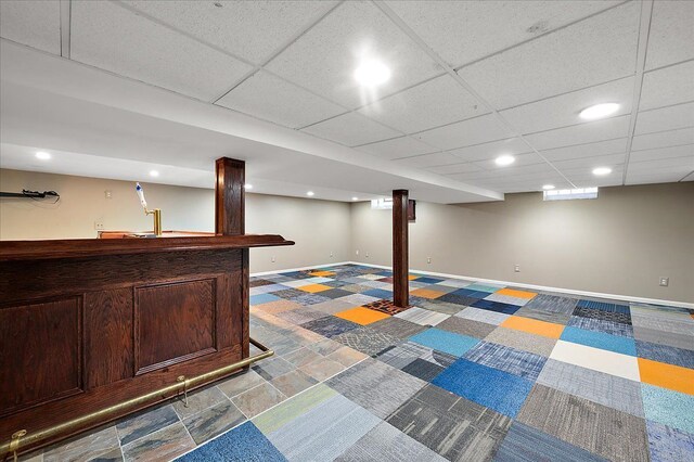 finished below grade area with baseboards and recessed lighting