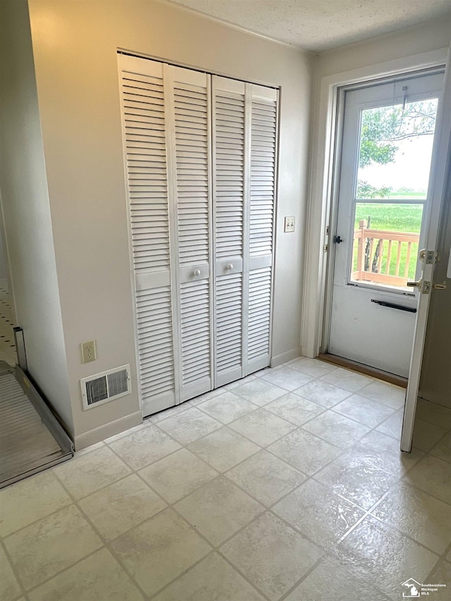 doorway with baseboards