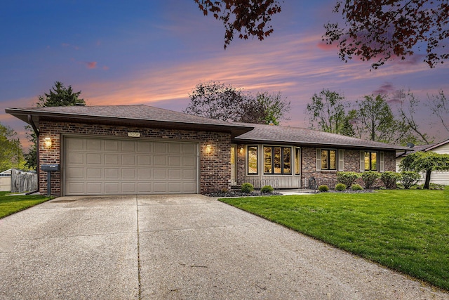 view of front of home featuring brick siding, concrete driveway, and an attached garage