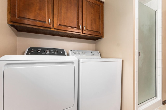 laundry room with washer and dryer